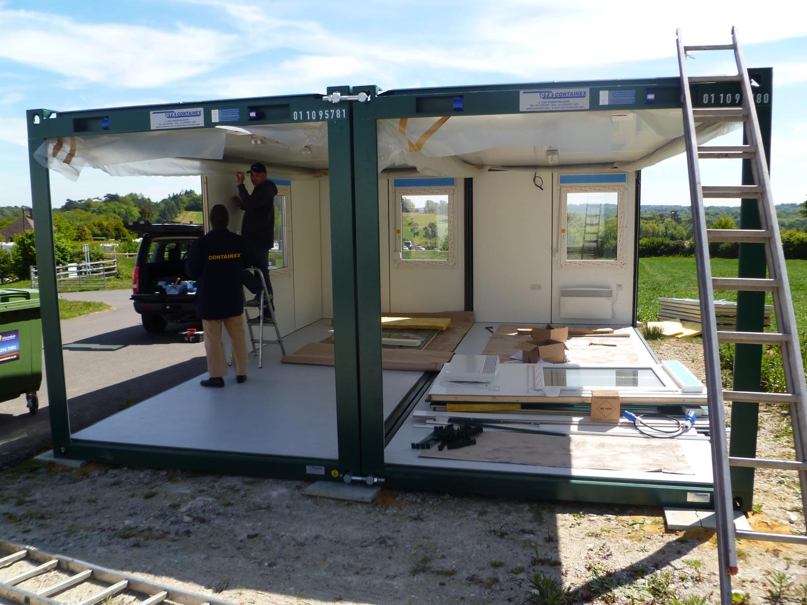 Containex engineers assembling a two-module cabin on site